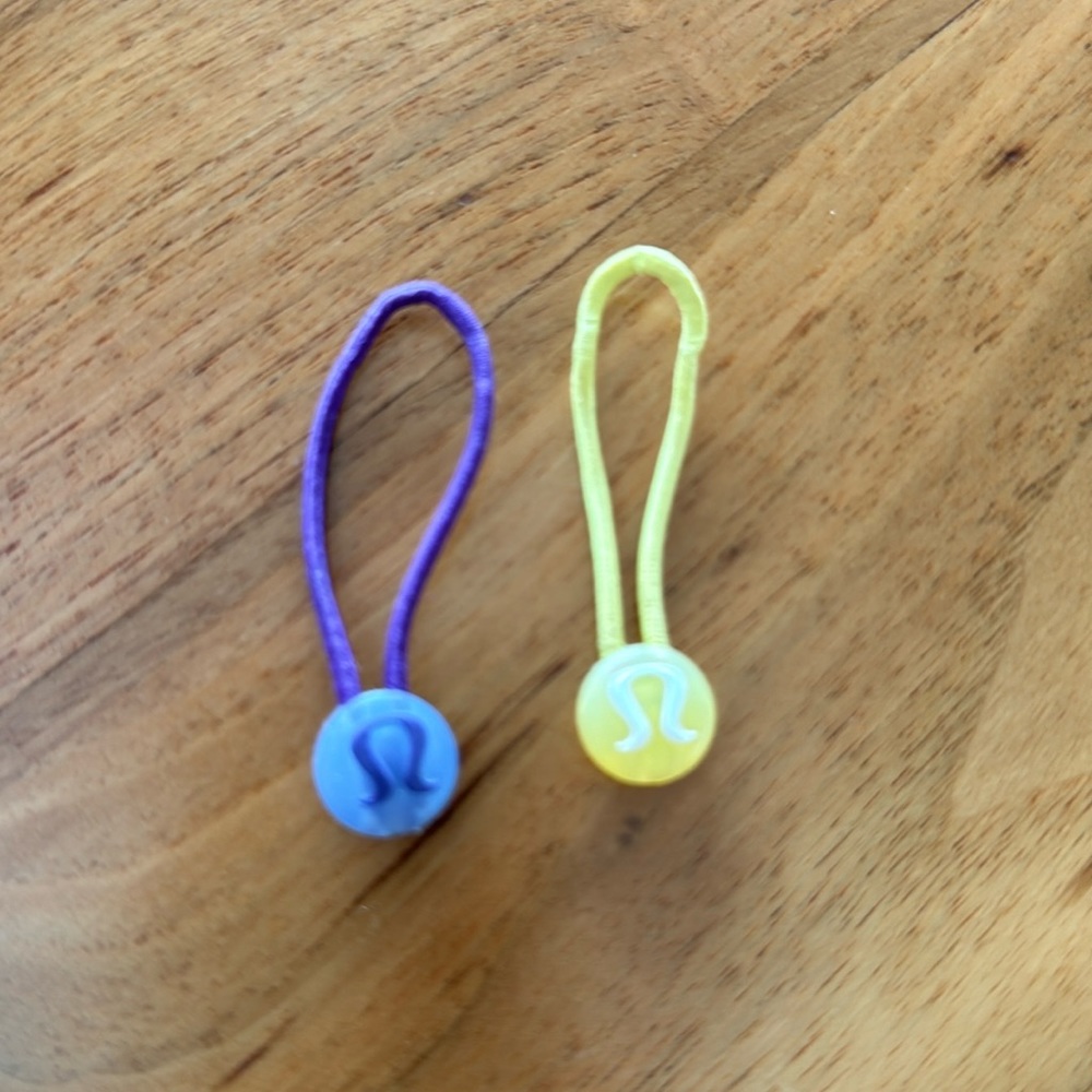 Lululemon zipper pulls/hair ties
